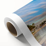 Art deco poster of Caribbean scenery on rolled canvas, featuring serene blue and white tones, ideal for nursery wall art.