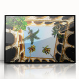 Large abstract wall art of a Caribbean Cuban scene in vibrant blues and greens, framed in black acrylic.