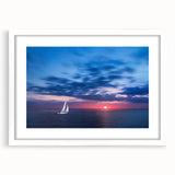 Textured art depicting abstract Caribbean scenery in muted blue and green tones on a framed white mat.