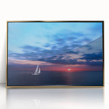 Large acrylic print of a Caribbean landscape with lush greenery and blue skies, framed in gold.