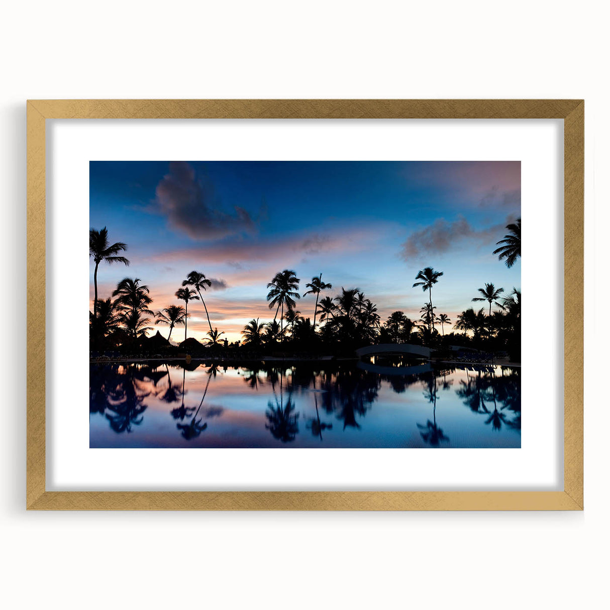 Abstract art print featuring vibrant Caribbean scenery in a gold frame, ideal for dining room decor.