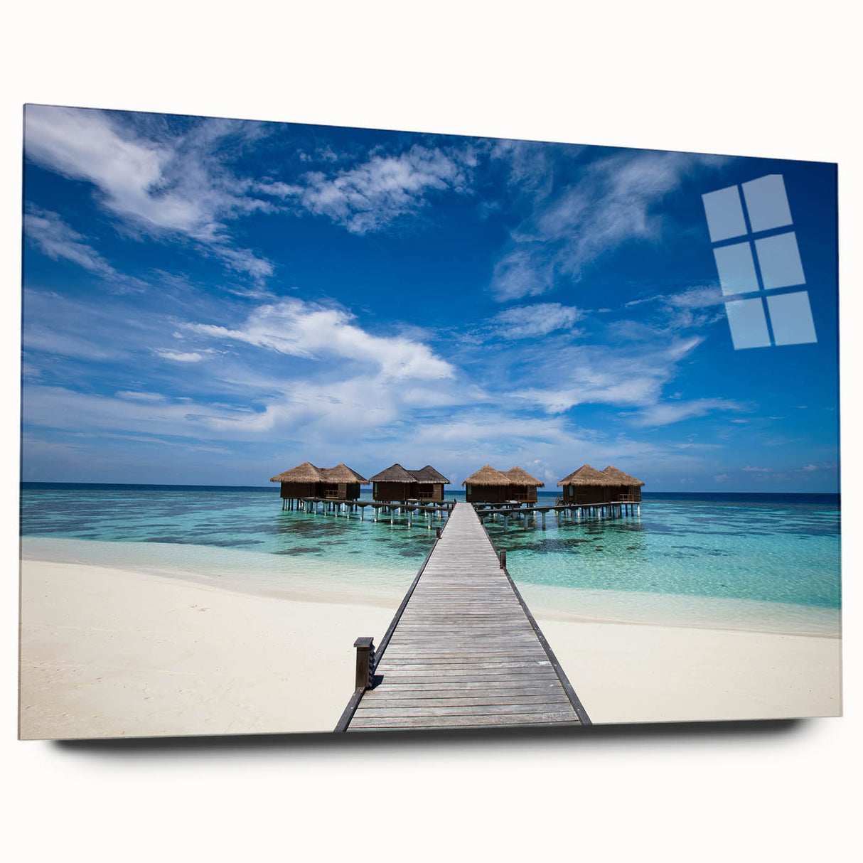 Large abstract wall art of Caribbean scenery in vibrant blue and green tones on acrylic glass.