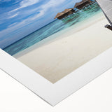 Art deco poster of a Caribbean scenery on rolled canvas, featuring pastel blues and greens.