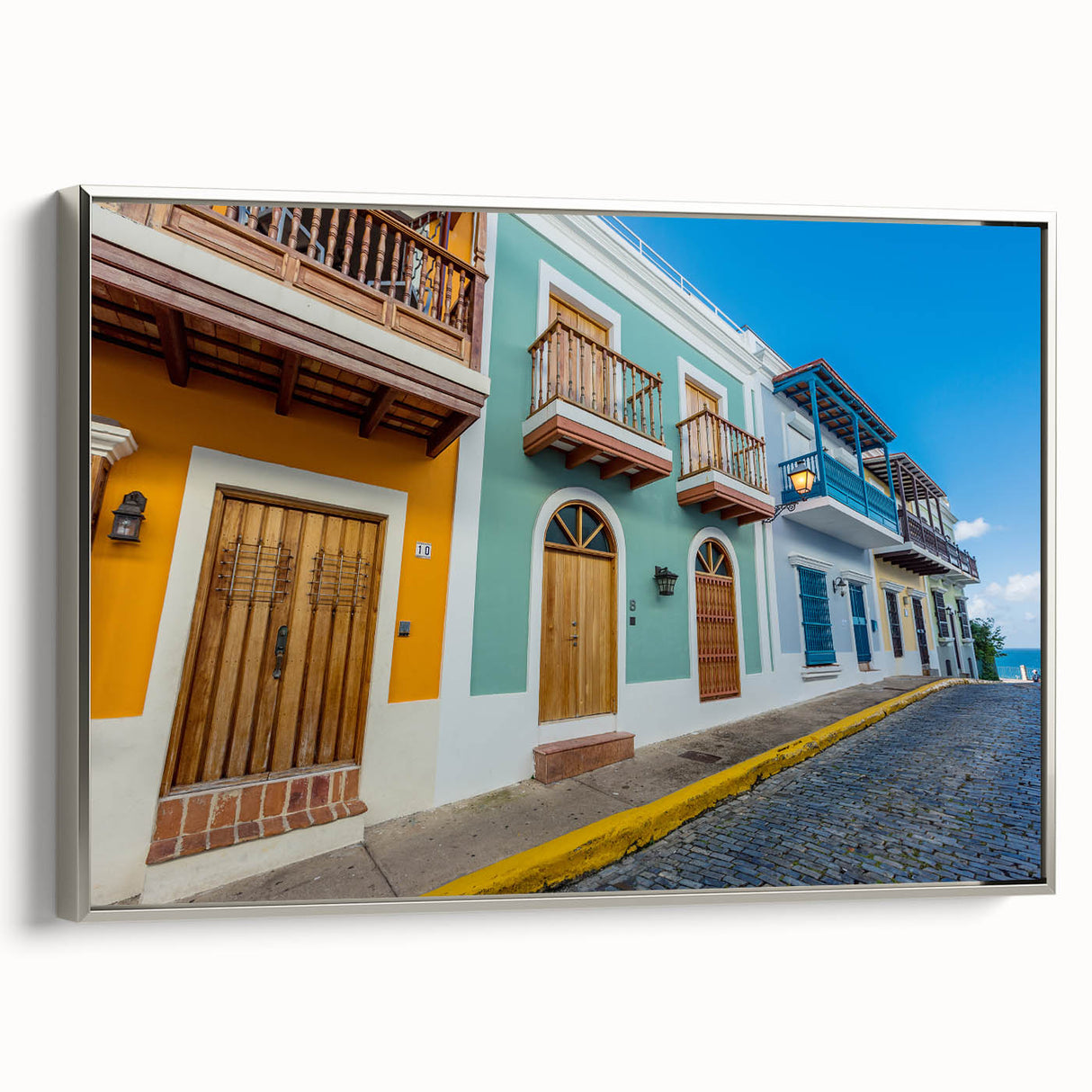 Landscape art painting of a Caribbean scene on framed canvas, featuring vibrant colors and vintage poster style.