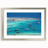 Extra large abstract art print of Caribbean scenery in muted blue and green tones on a framed canvas.