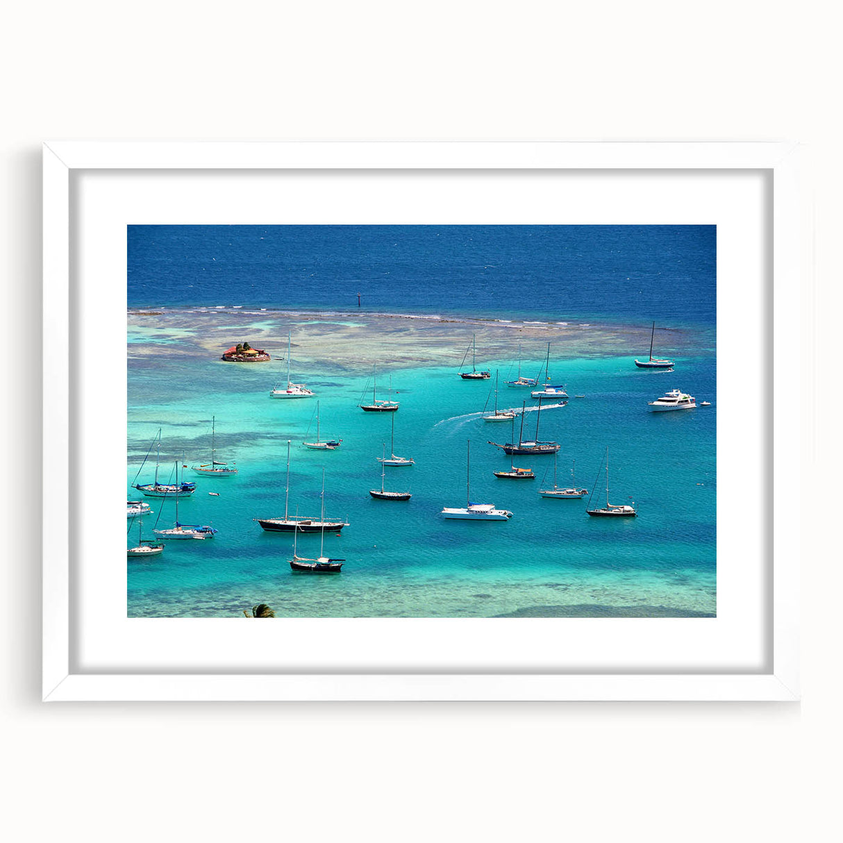 Textured abstract art print of Caribbean scenery in muted blue and green tones on a framed white mat, ideal for bedroom art.