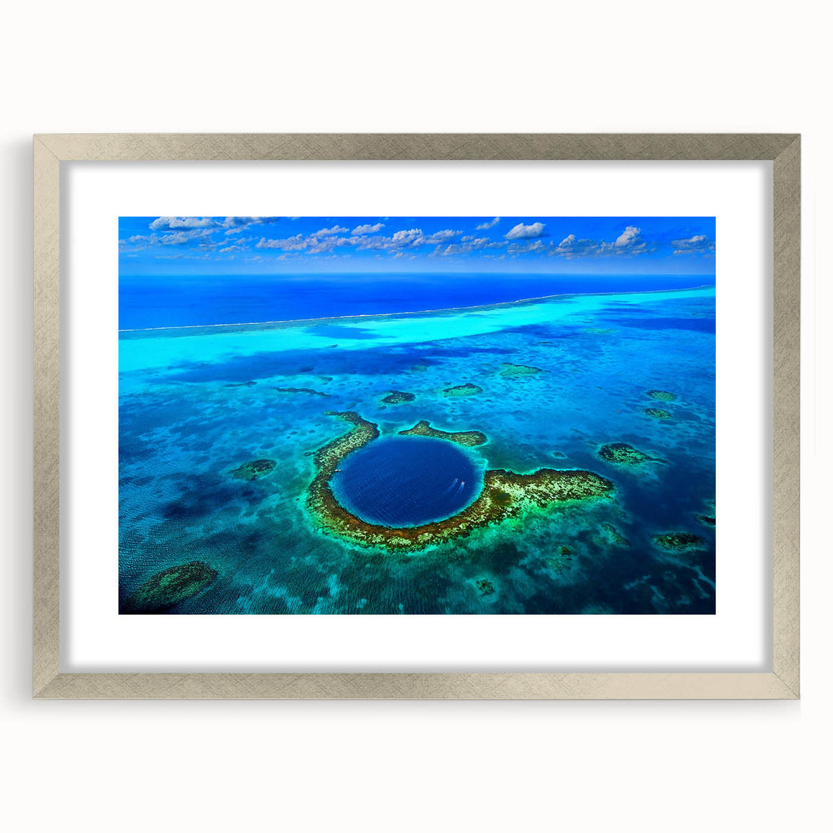 Textured abstract art print of a Central American scenery in muted earth tones, framed in silver, ideal for bedroom art.