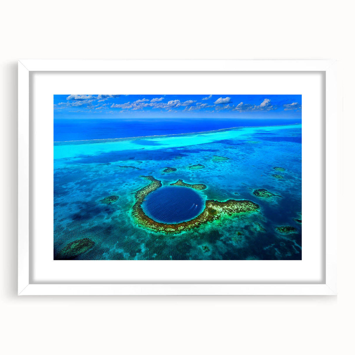 Abstract art print of a Central American landscape in muted earth tones, framed with a white mat.