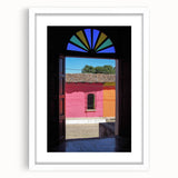 Abstract art print featuring a stylized El Salvador landscape in muted earth tones, framed in white.