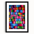Extra large abstract art print of a colorful Central American scenery on textured canvas, framed in black.