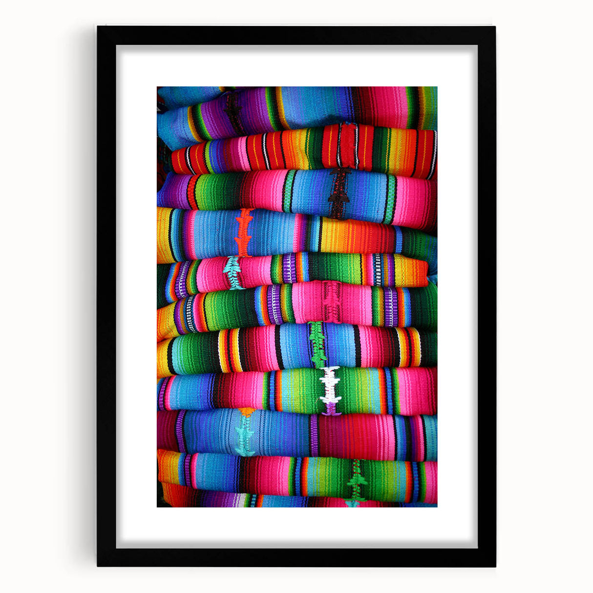 Extra large abstract art print of a colorful Central American scenery on textured canvas, framed in black.