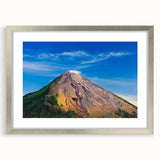 Textured abstract art print depicting Central America scenery in muted earth tones on a framed silver mat.