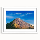 Abstract art print of a Central American landscape in muted earth tones on a white framed mat.