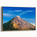 Framed canvas featuring a vintage-style landscape painting of a Nicaraguan scenery in muted gold and black tones.