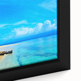 Close-up of a framed canvas featuring a black textured art scene of Central America with vibrant, colorful accents.