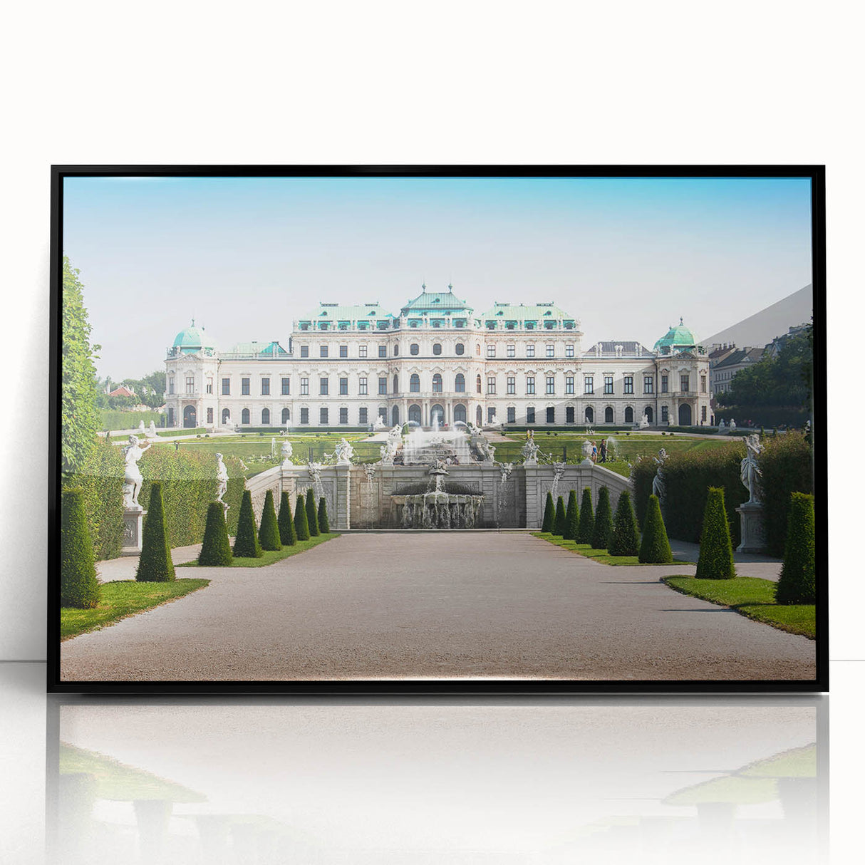 Large abstract wall art depicting a European cityscape in muted gray and blue tones on a framed acrylic.