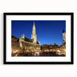 Abstract art print of a colorful European scenery in muted tones on a large framed canvas, ideal for living room decor.