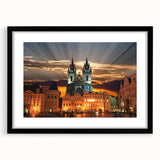 Abstract art print of a colorful European cityscape in vibrant hues, framed in black, ideal for living room decor.