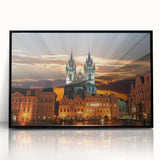 Large abstract wall art of a European cityscape in muted gray tones, framed in black acrylic.