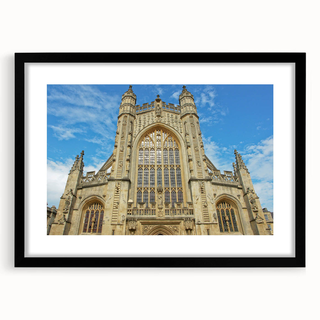 Extra large abstract art print of a colorful European scenery, framed in black, ideal for living room decor.