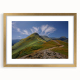 Abstract art print of Cumbria, England landscape in muted green and blue tones, framed with a gold mat.
