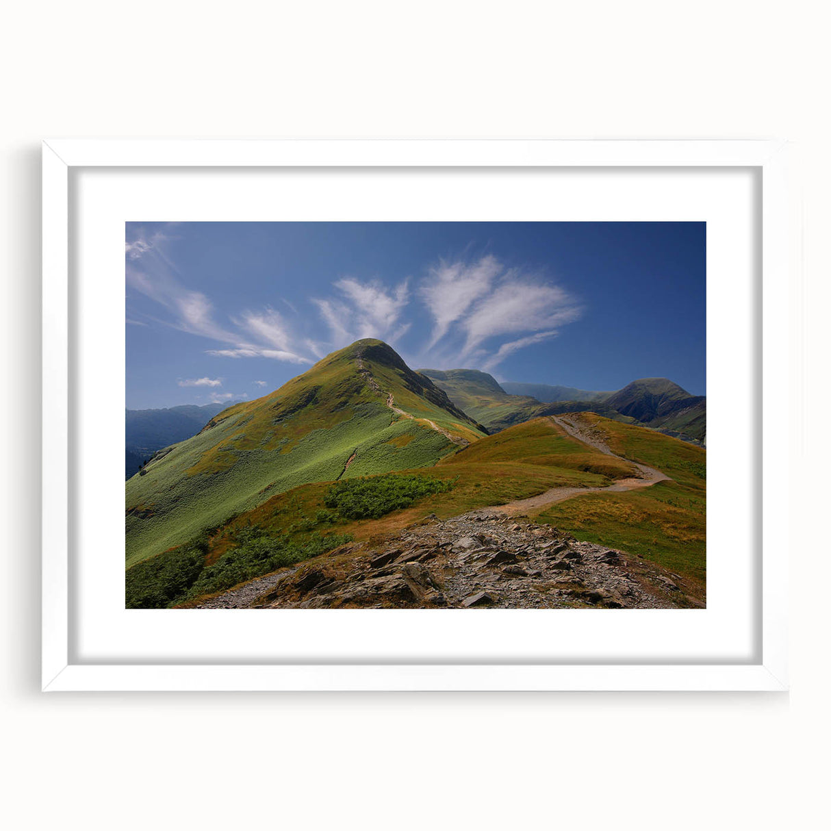 Textured art print of an abstract Cumbria landscape in muted earth tones, framed with a white mat, ideal for bedroom decor.