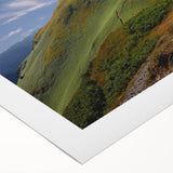 Art deco poster of Cumbria landscape in muted green and blue tones, on rolled canvas, suitable for dining room wall art.