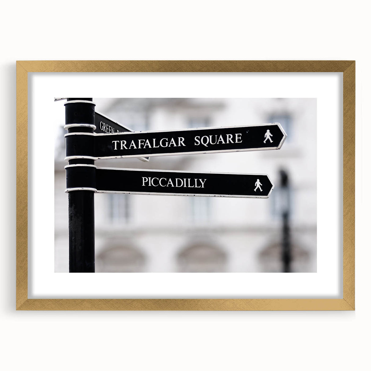 Abstract art print of Piccadilly, England in muted gold tones on a framed mat, suitable for dining room decor.