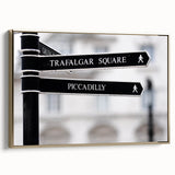 Framed canvas depicting a vintage-style landscape of Piccadilly, England in muted gold and black tones.