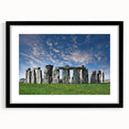 Extra large textured abstract print of Stonehenge in vibrant colors on a framed black mat, ideal for living room decor.