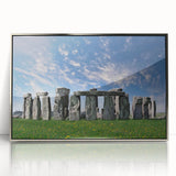 Mid-century modernist acrylic print of Stonehenge in muted earth tones, framed in silver, ideal for modern art wall decor.