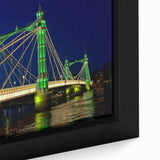 Black wall art featuring a textured depiction of the Thames River in vibrant colors on a framed canvas.