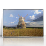 Mid-century modernist art depicting a European Estonian landscape in muted green and blue tones, framed acrylic print.