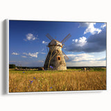 Vintage poster art of a European cityscape in vibrant colors on a large framed canvas, ideal for living room decor.