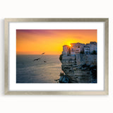 Extra large abstract art print of Corsican scenery in muted earth tones on a silver-framed canvas.