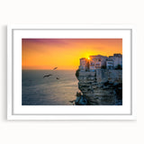 Textured art print of a Corsican landscape in muted earth tones on a white framed mat, suitable for bedroom decor.