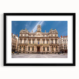 Extra large colorful art print of abstract Lyon scenery in vibrant hues on textured canvas, framed in black.