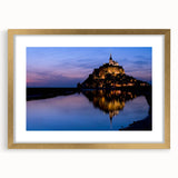 Abstract art print of a European scenery in muted gold and blue tones, framed with a gold mat, ideal for dining room decor.