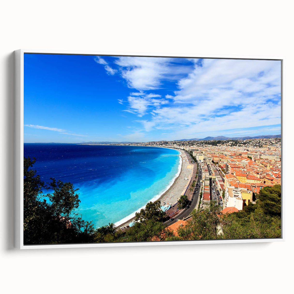 Vintage poster art of Nice, France in vibrant colors on a large framed canvas, ideal for living room decor.