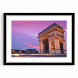 Colorful abstract art print of Paris scenery in vibrant hues on a large textured canvas, framed with a black mat.