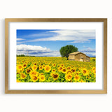 Abstract art print of a South France scenery in muted earth tones, framed in gold, suitable for dining room decor.