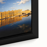 Extra large framed canvas of a textured depiction of the Versailles Palace in muted black and colorful art accents.