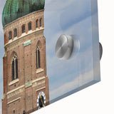 Large abstract wall art of Munich skyline in muted blue tones on acrylic glass, ideal for dining room ambiance.