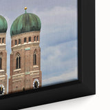 Framed canvas of a textured Munich cityscape in black with vibrant colorful accents, ideal for living room decor.