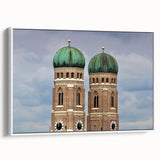Vintage poster art of Munich scenery on framed canvas, featuring colorful artwork on a black background.