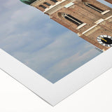 Art deco poster of Munich skyline in muted gold and navy tones on rolled canvas, suitable for dining room decor.