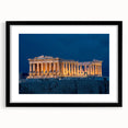 Extra large abstract art print of a colorful Athens scenery in muted orange and blue tones, framed with black mat.
