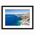 Colorful abstract art print of a European scenery, in a black frame with mat, ideal for living room decor.