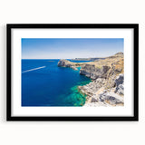 Colorful abstract art print of a European scenery, in a black frame with mat, ideal for living room decor.