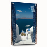 Acrylic print of Santorini landscape with white buildings and blue domes, ideal for bedroom or dining room decor.